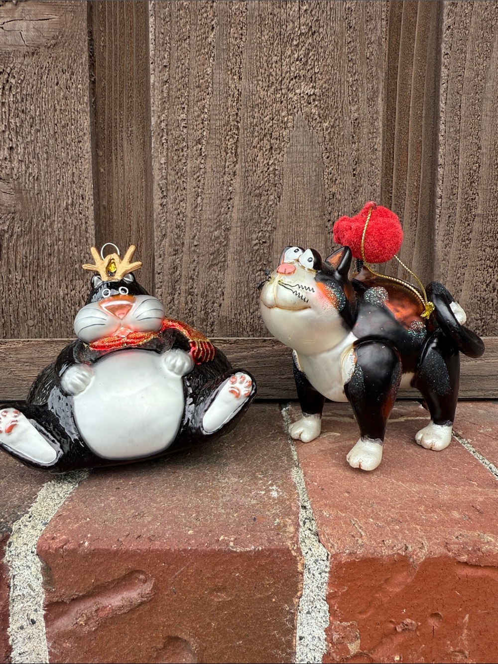 Decorative Black & White Ceramic Cat Figurines with Red Accents